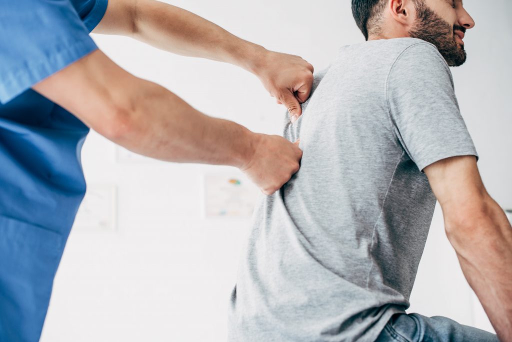 workers comp chiropractor in Yaphank